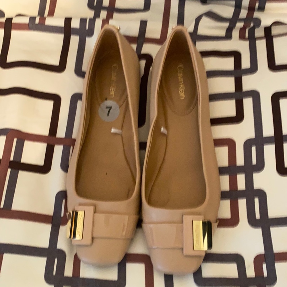 Women’s Calvin Klein size 7 shoes.